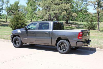 distant view of the small decal wrapping around a car badge on the dodge ram