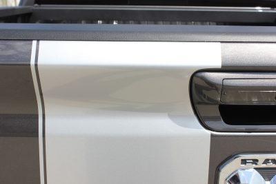 closeup of the dodge ram decal wrapping around the door handle area